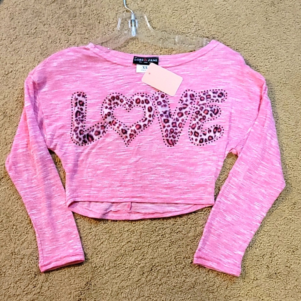Girls Pink Crop shirt.